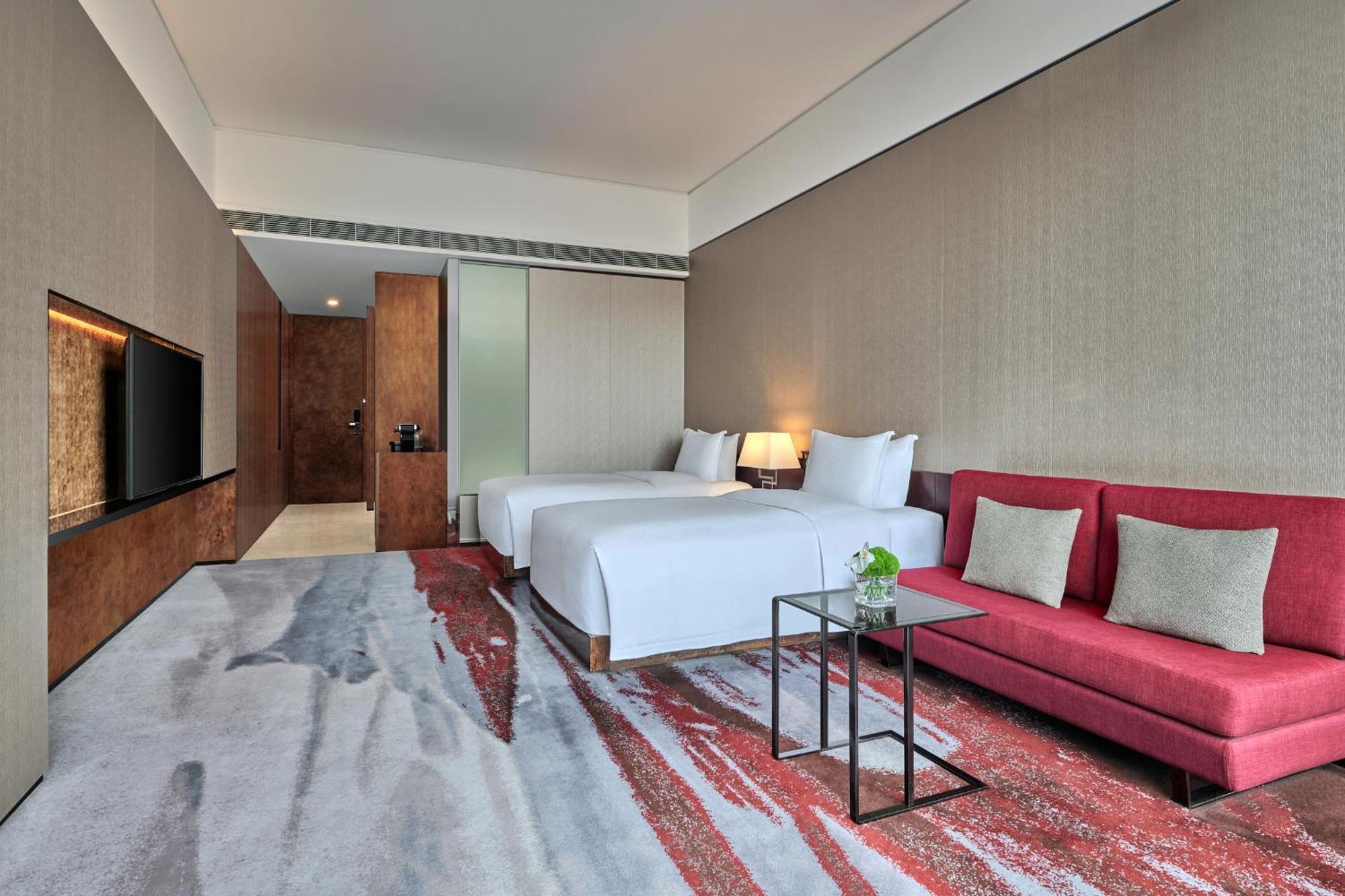 Hilton Guangzhou Tianhe - Free Shuttle Bus And Registration Counter Available During Canton Fair Period Exterior foto Deluxe Room
