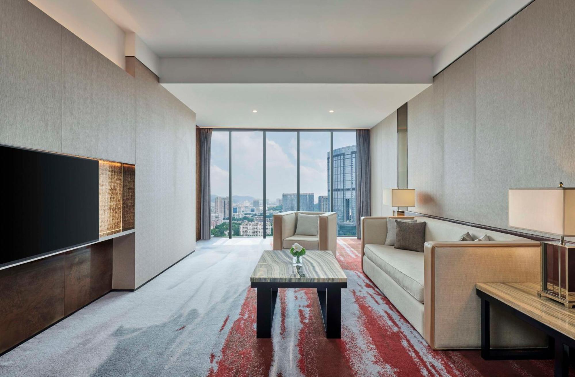 Hilton Guangzhou Tianhe - Free Shuttle Bus And Registration Counter Available During Canton Fair Period Exterior foto A suite at the hotel